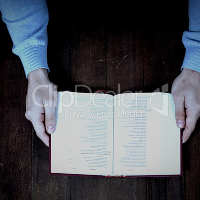 Cropped man holding bible