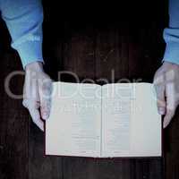 Cropped man holding bible
