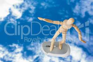 Composite image of 3d image of carefree wooden figurine standing on computer mouse