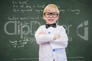 Child dressed like a professor in front of black board with school scriptures