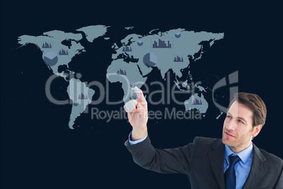 Businessman is showing a graphics against world wide map background