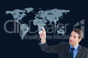 Businessman is showing a graphics against world wide map background