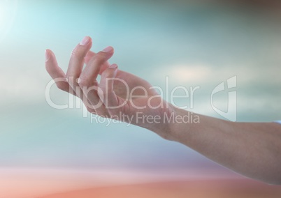 Hand reaching half open with sparkling light bokeh background