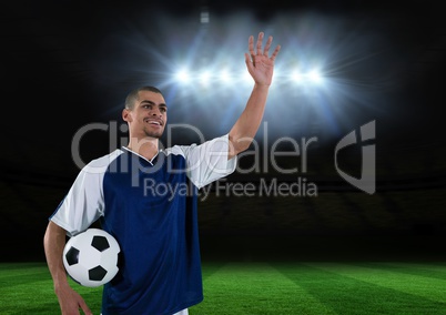 Soccer player weaving at the fans in the field