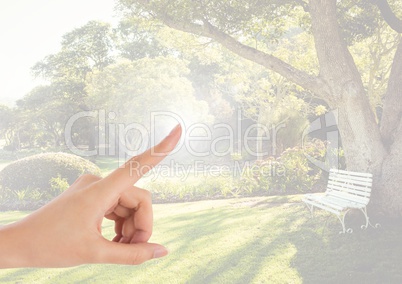 Hand touching air with nature park gardens background