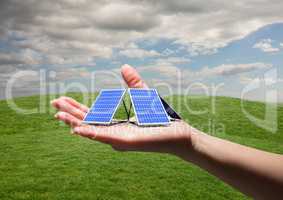 solar panels  on hand in field