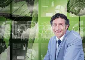 Portrait of smiling businessman against 3d image of graphs pie diagram and growth arrows