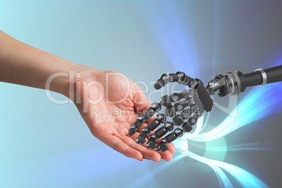 Human and robot touching their hands in blue background