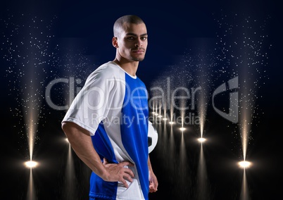 soccer player in a lights corridor