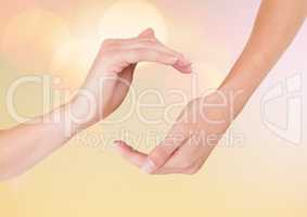 Hands in curved posture  with sparkling light bokeh background