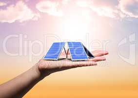 solar panel on hand sky back