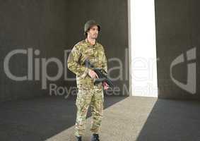 soldier with weapon in a concrete room with door