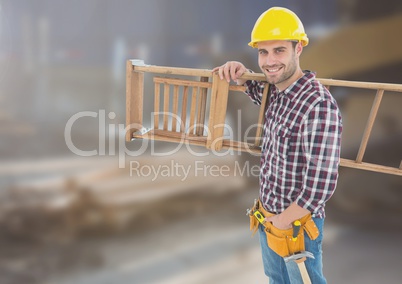 Construction Worker with ladder in front of construction site