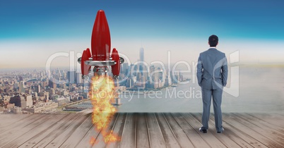 Digital composite image of businessman standing by rocket launch on pier while looking at sea and ci