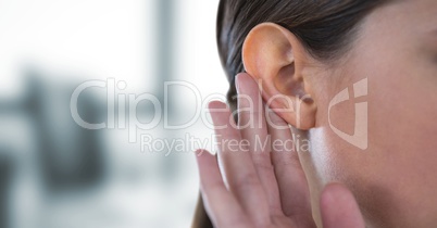 Cropped image of woman hearing gossip