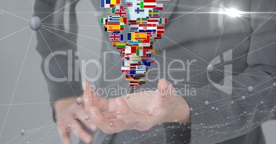 Midsection of business person with various flags and connecting dots