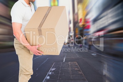 Deliver is holding a package against city scape background