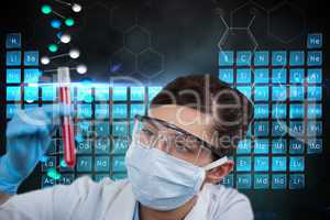 Medical models is holding a test tube against DNA graphics backgrounds