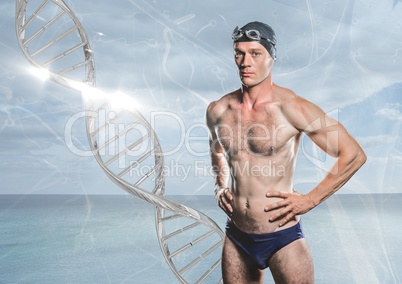 swimmer with silver dna chain in front of the sea