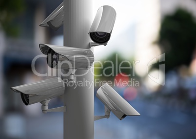 Focus on CCTV group in a blurred street