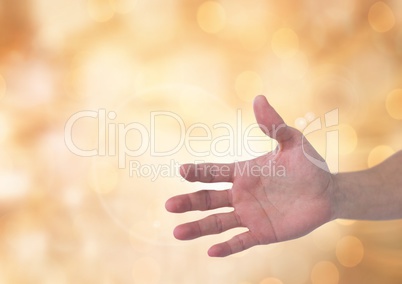 Hand open with sparkling light bokeh background