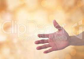 Hand open with sparkling light bokeh background