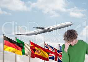 main language flags behind young man. Plane behind