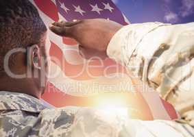 soldier in front of usa flag saluting