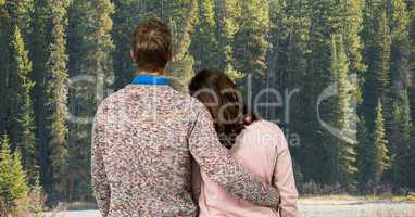 Rear view of couple looking at forest