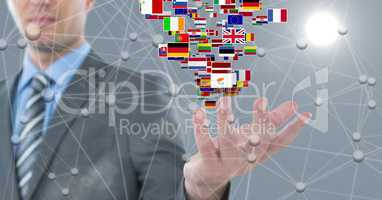 Digital image of businessman with various flags and connecting dots