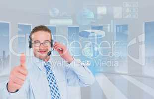 Businessman wearing Head set is showing thumbs up against office background