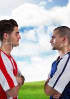 soccer players looking each other