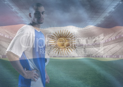 soccer player with the hands on the waist in the field,  superimpose with flag