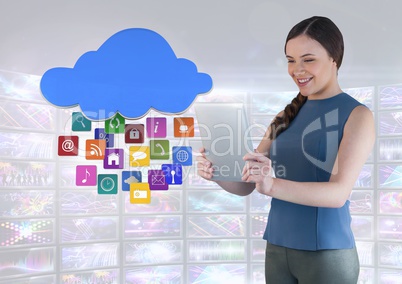 Businesswoman holding tablet with apps