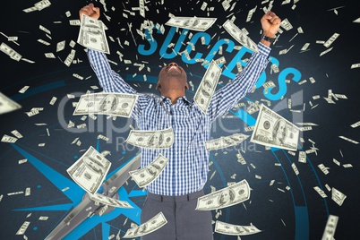 businessman expresses his joy against money falling from the sky background