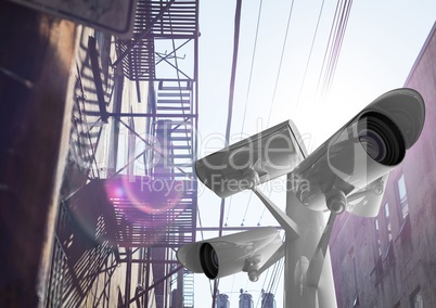 The top of the CCTV stick in the street with purple flares