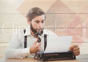 Hipster man  on typewriter with wood