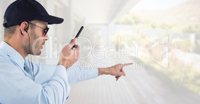 Security man outside bright background house porch