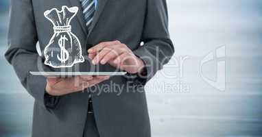 Business man mid section with tablet and white money bag graphic against blurry blue wood panel