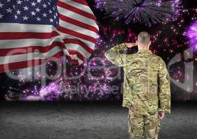 soldier in front of fireworks with usa flag