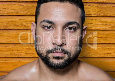 fitness man foreground with yellow wood background