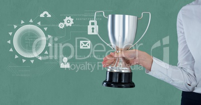 Cropped businesswoman holding trophy against icons Cropped businesswoman holding trophy against icons