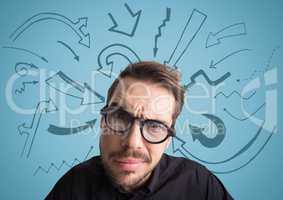 Close up of confused man with glasses against blue background with arrow graphics