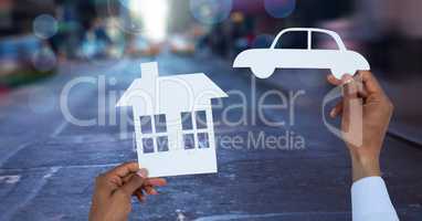 Cut outs house and car on street