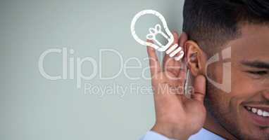 Cropped image of happy businessman listening idea against green background