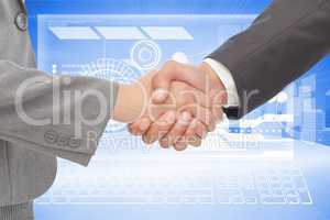 Business partners shaking their hands in front of digital background