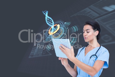 Medical models touching tablet computer against DNA graphics backgrounds