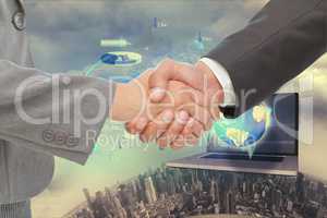 Business man Handshake against technology background