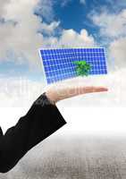 solar panel on hand of a business woman. Floor and sky