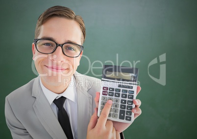 Man looking up with calculator against green chalkboard